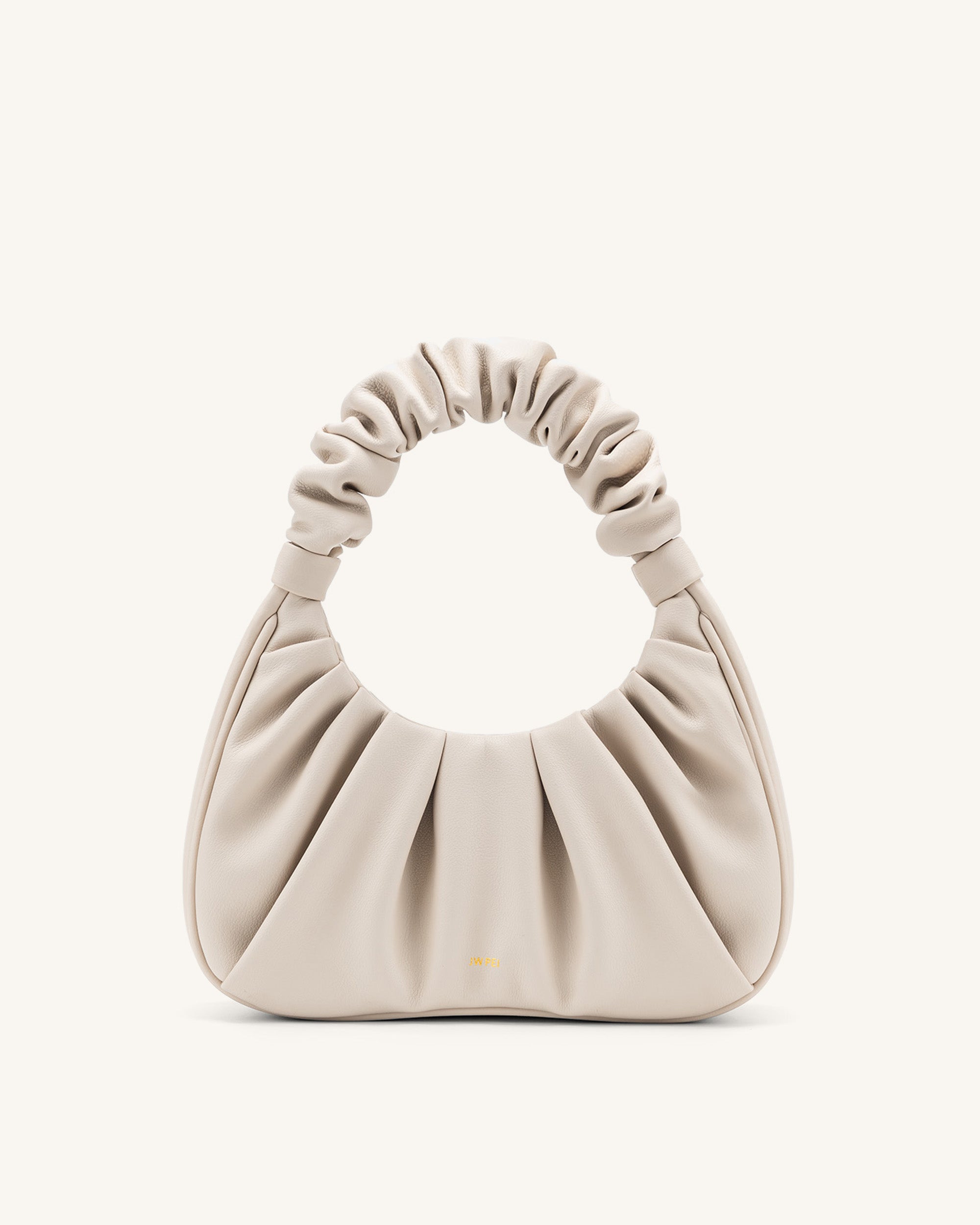 2t03-1_2_6f417ba3-6bc6-48e1-b336-0bd3b2c023ef Gabbi Ruched Hobo Handbag - Ivory - Image 1